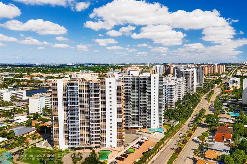 a view of a city with tall buildings