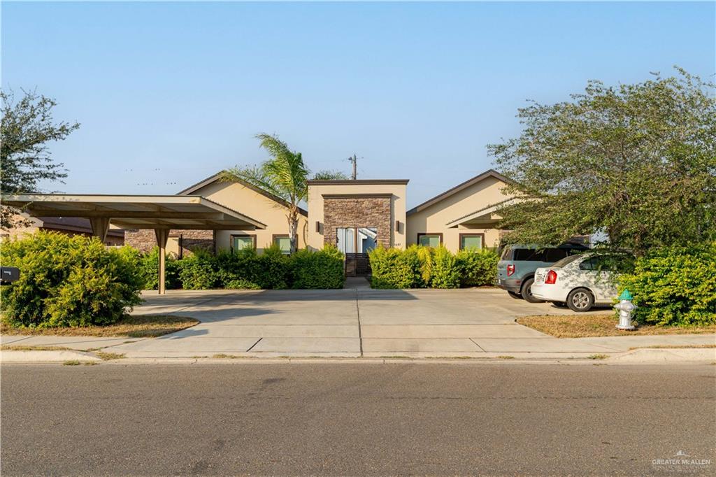 front view of a house with a yard