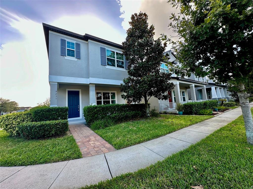 a front view of a house with a yard