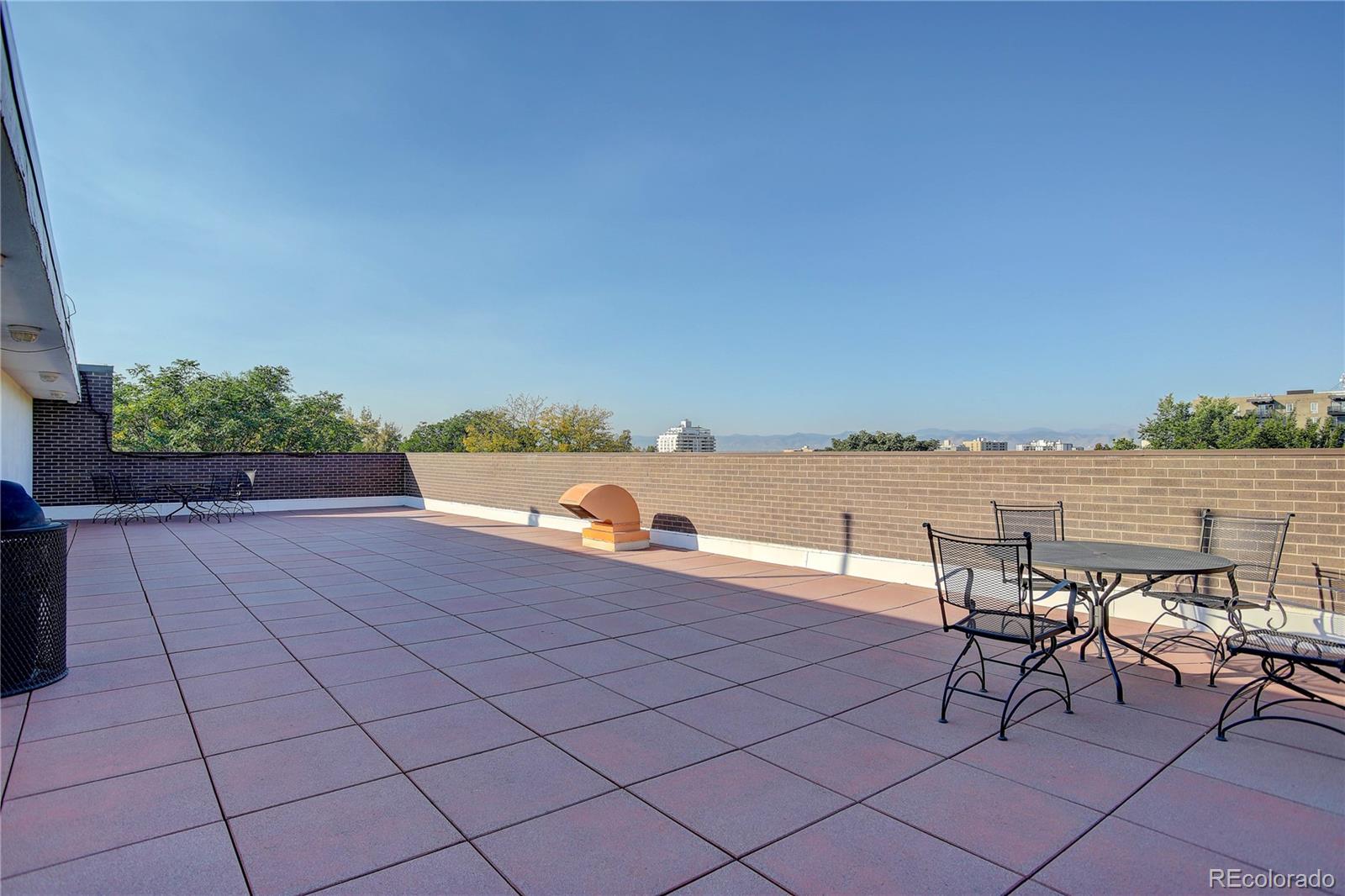 a view of a terrace with furniture