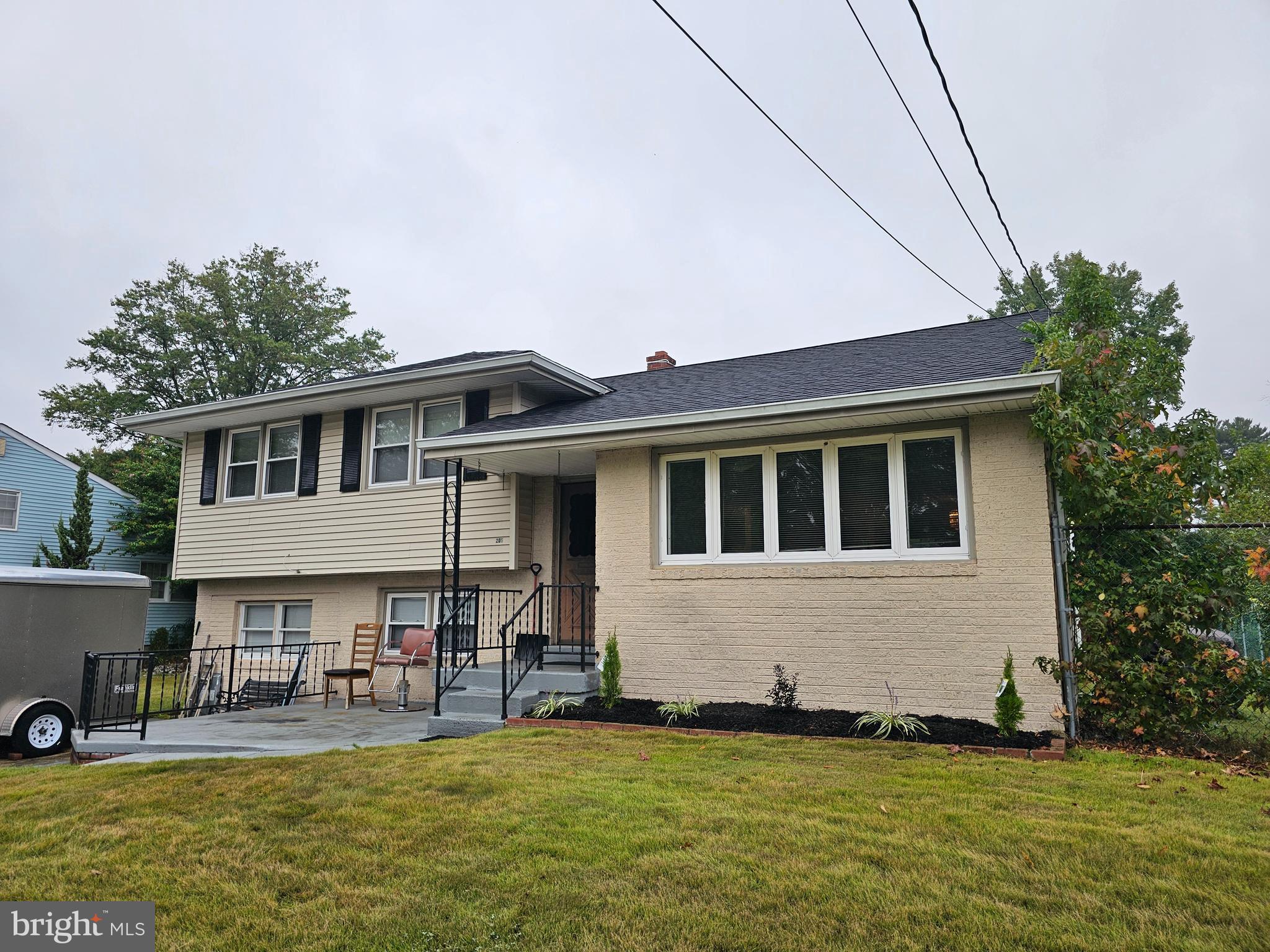 a house view with swimming pool and porch