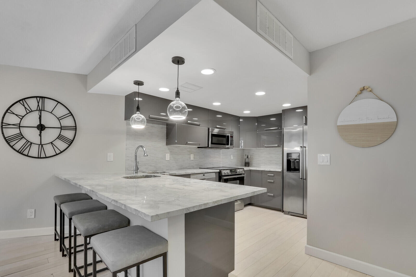 a kitchen with a table and chairs in it