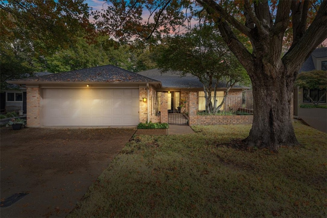 a house view with a garden space