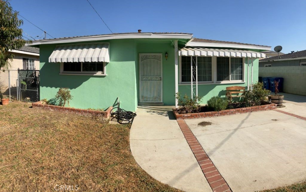 a view of a house with a patio