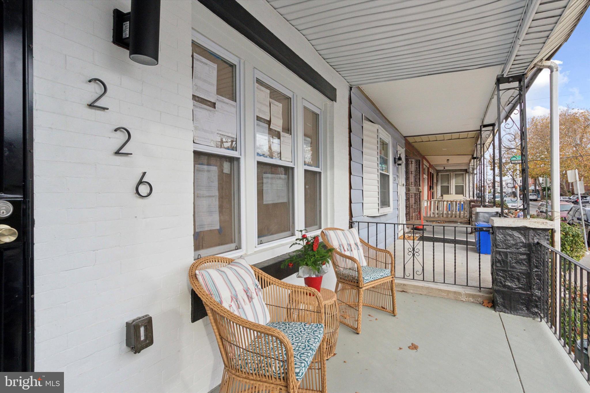 a view of balcony with furniture