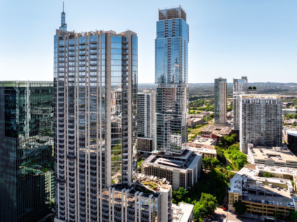 a view of city with tall buildings