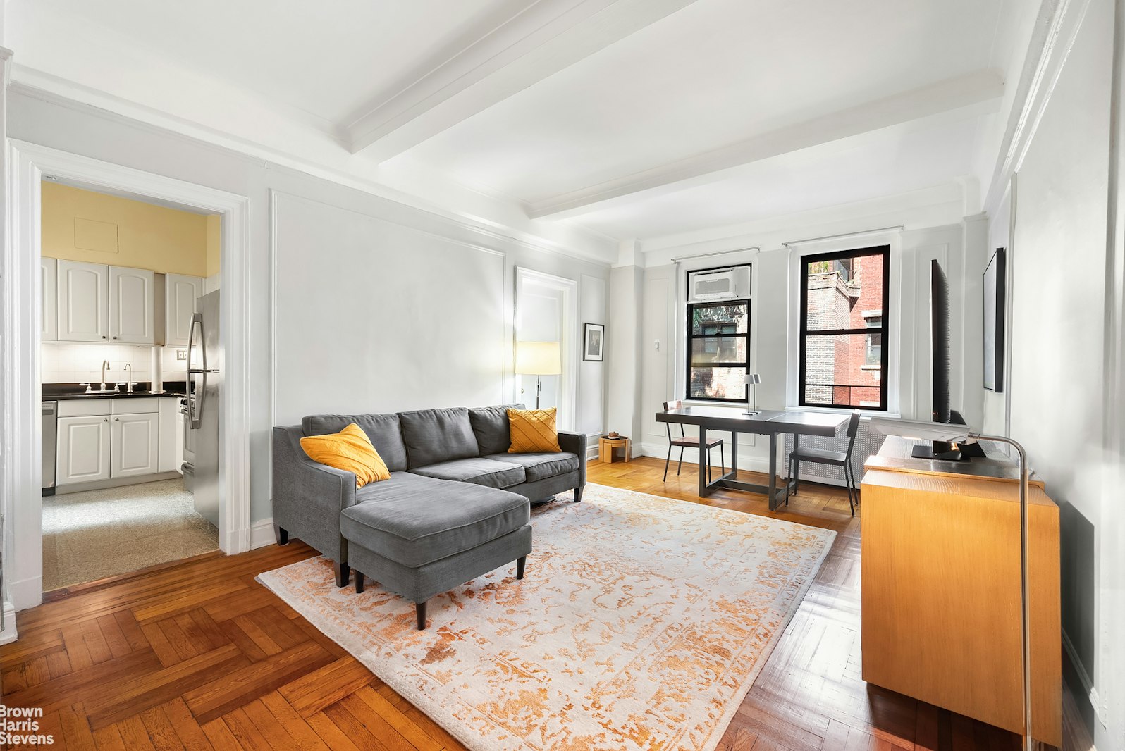 a living room with furniture and a table