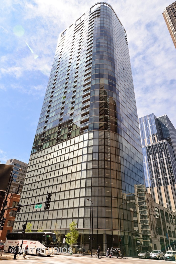 a tall building sitting next to a street