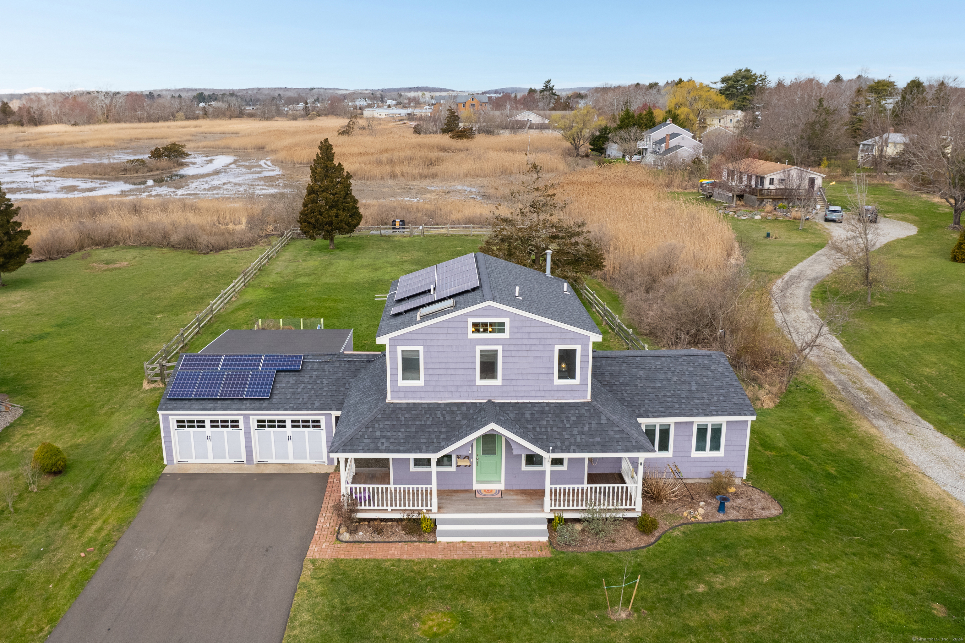 Welcome Home to 49 Seaside Avenue in the historic town of Guilford, CT!