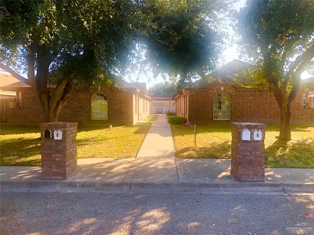 a view of a pathway with a building in the background