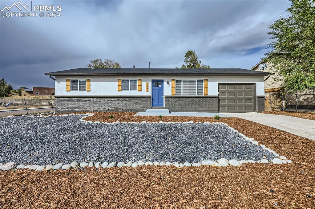 Ranch-style home with a one car garage