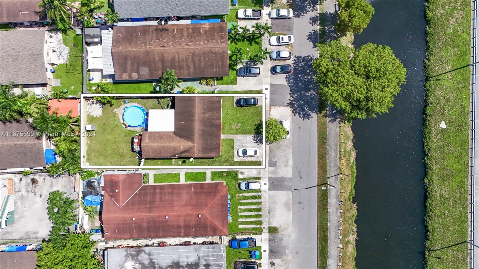 an aerial view of a house with a garden