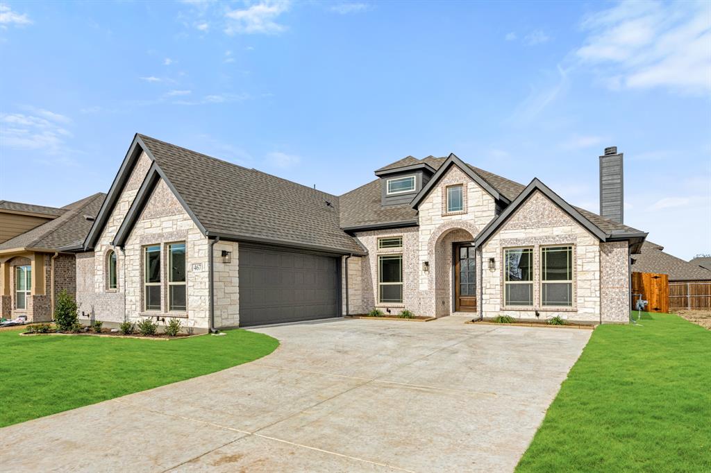 front view of a house and a yard