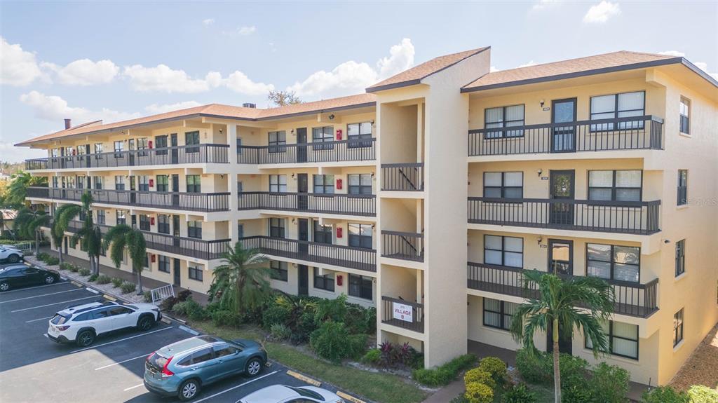 a front view of a building with balcony