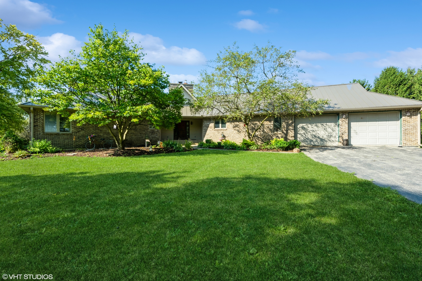 a front view of house with garden