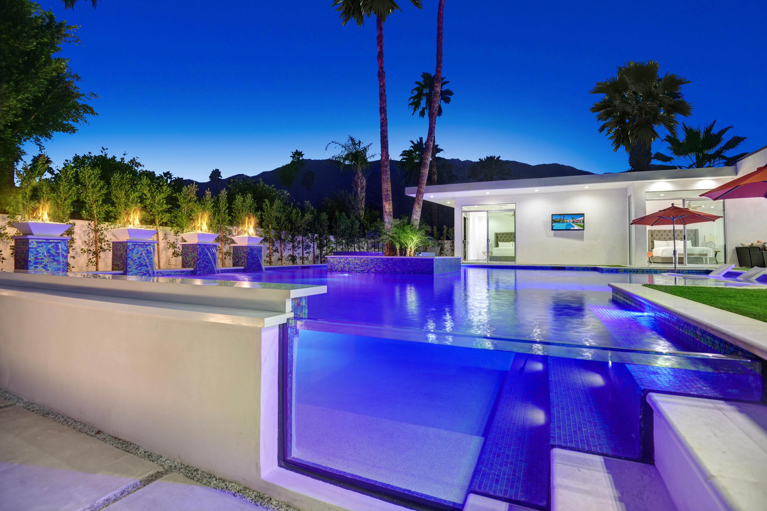 a view of a house with a swimming pool