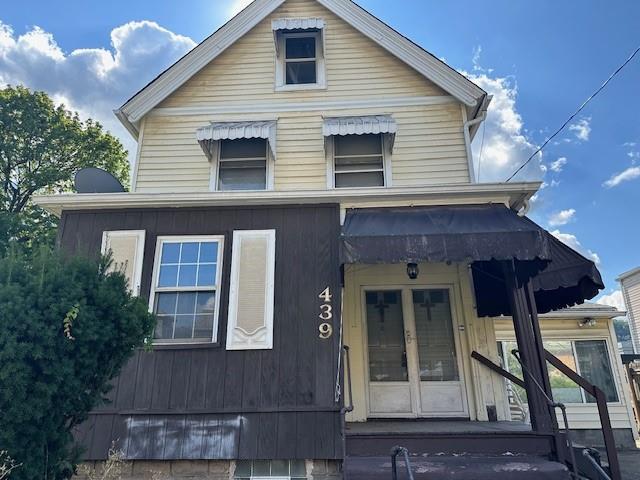 a front view of a house with a garage