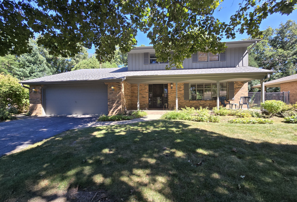 front view of house with a yard