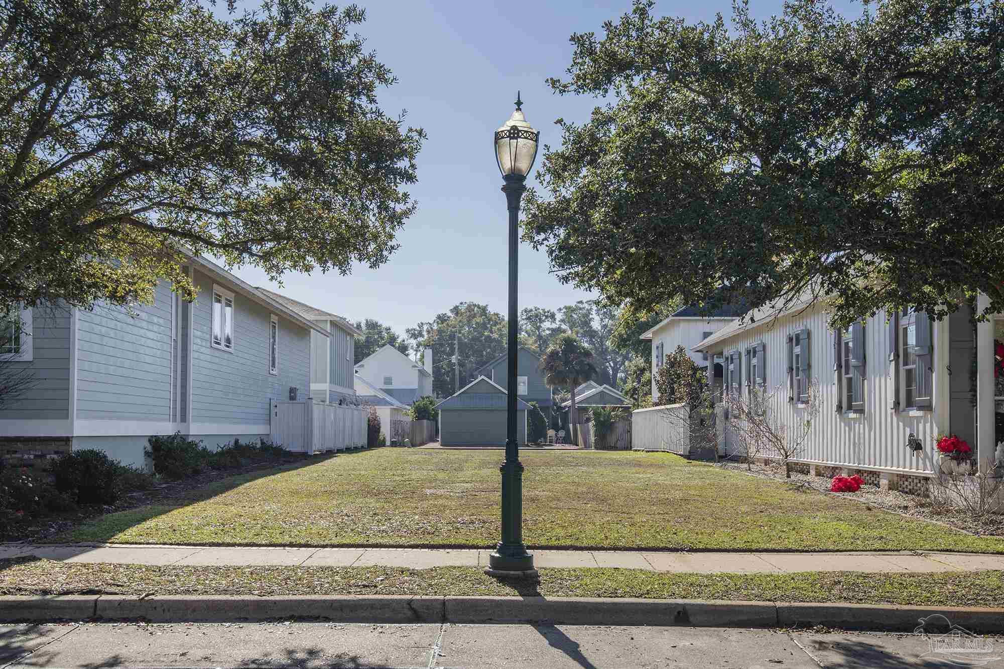 a view of street with houses