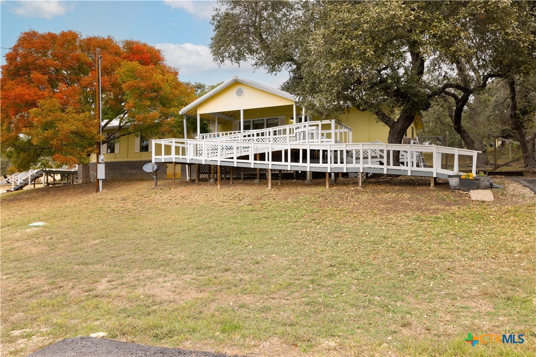 a view of a house with roof deck