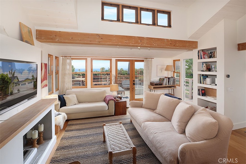 Living room with vaulted ceilings