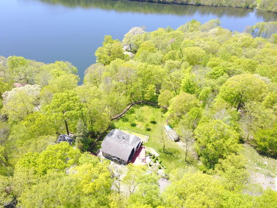 a swimming pool with lake view