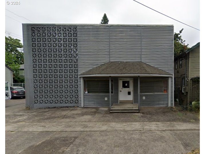 a front view of a house with a garage