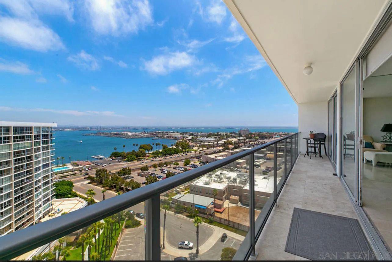 a view of a balcony with city view