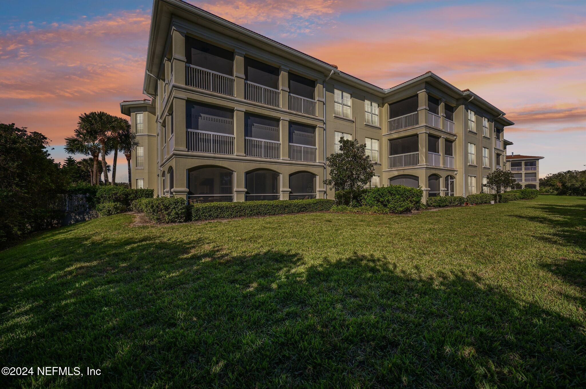 a view of building with yard