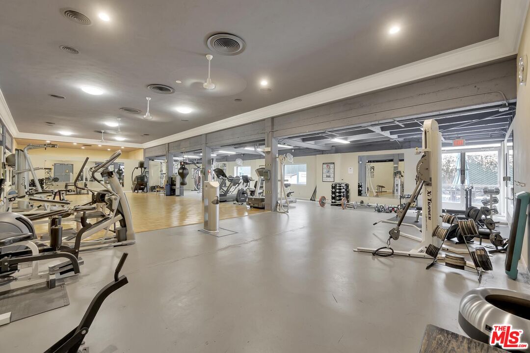 a view of a room with gym equipment