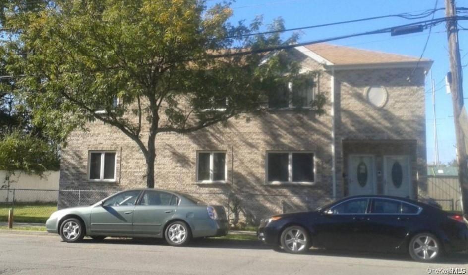 a car parked in front of a house