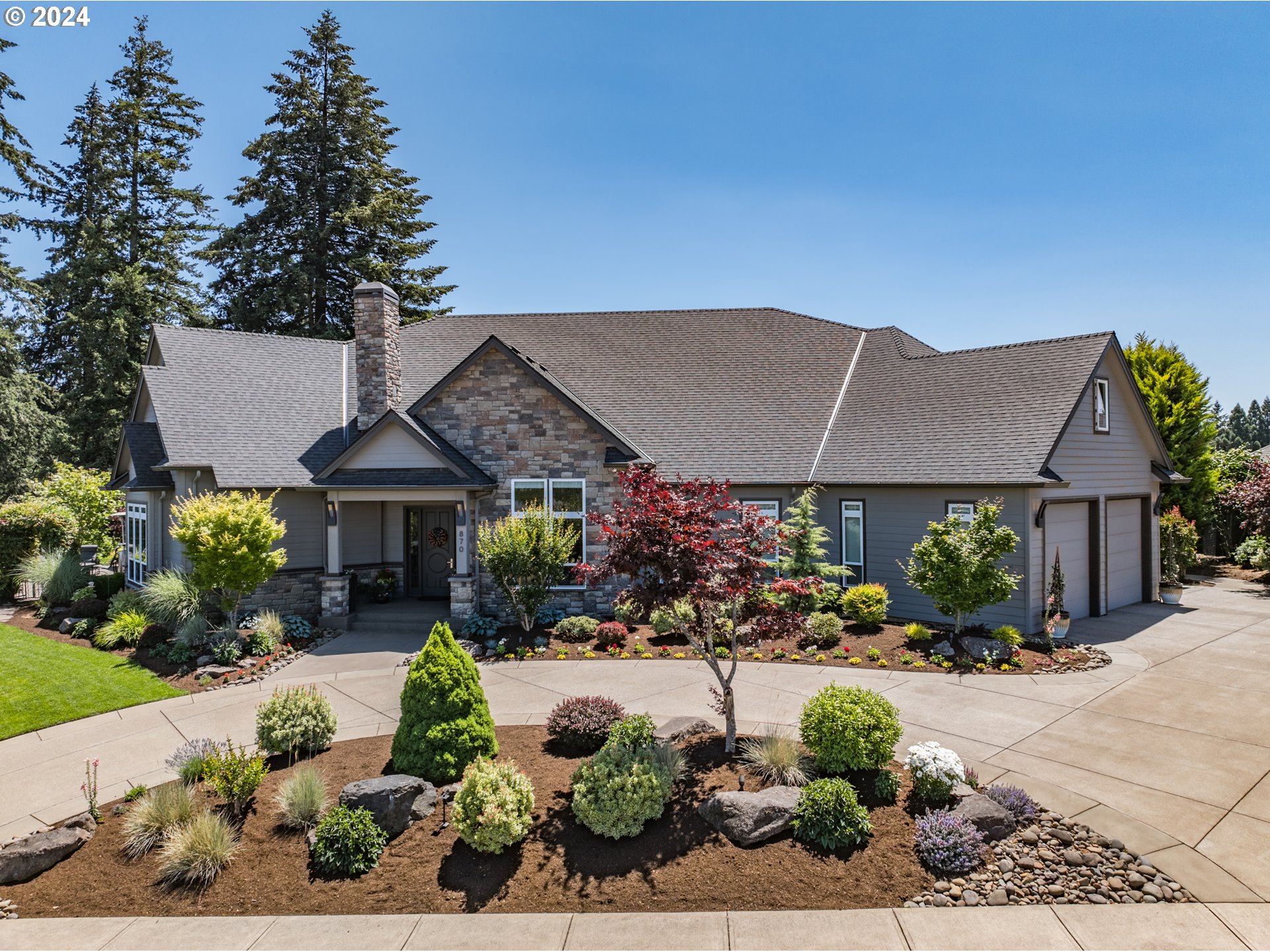 front view of a house with a yard