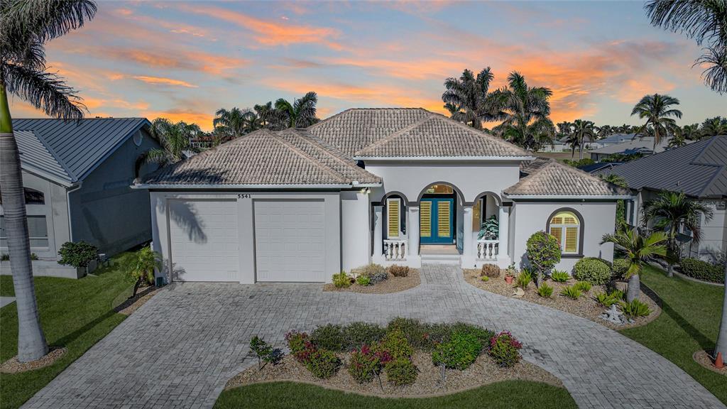 a front view of house with yard outdoor seating and entertaining space