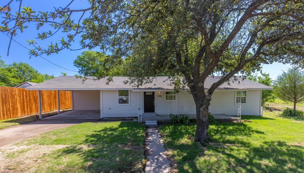 front view of house with a yard