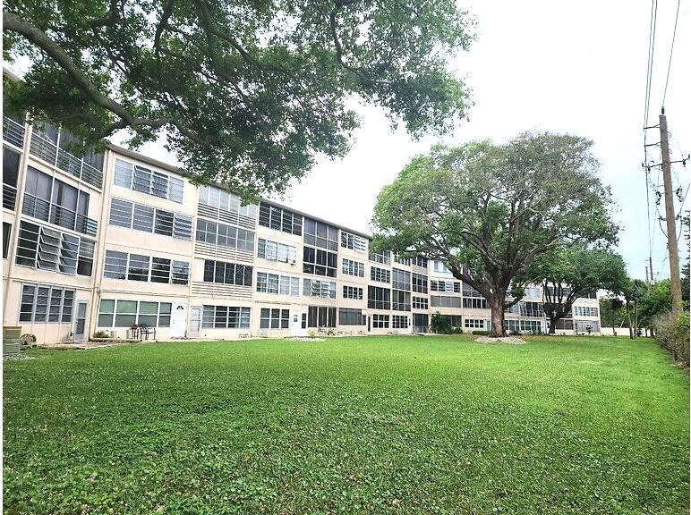 a building view with a garden space