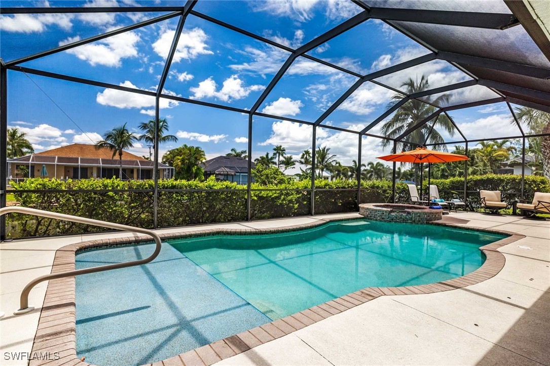 a view of swimming pool with a patio