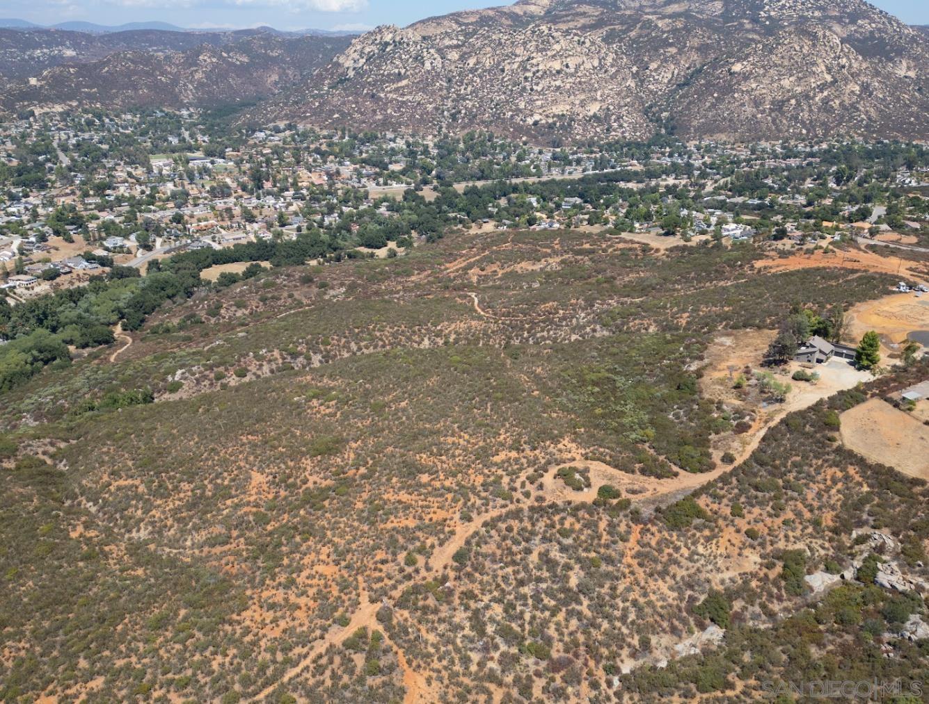 an aerial view of residential house and space