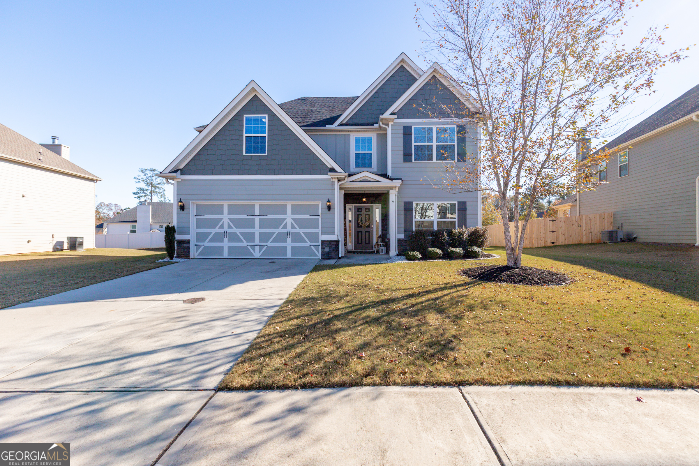 a front view of house with yard