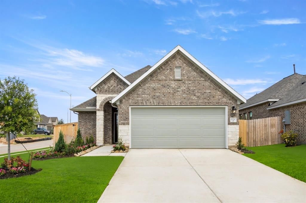 a front view of house with yard