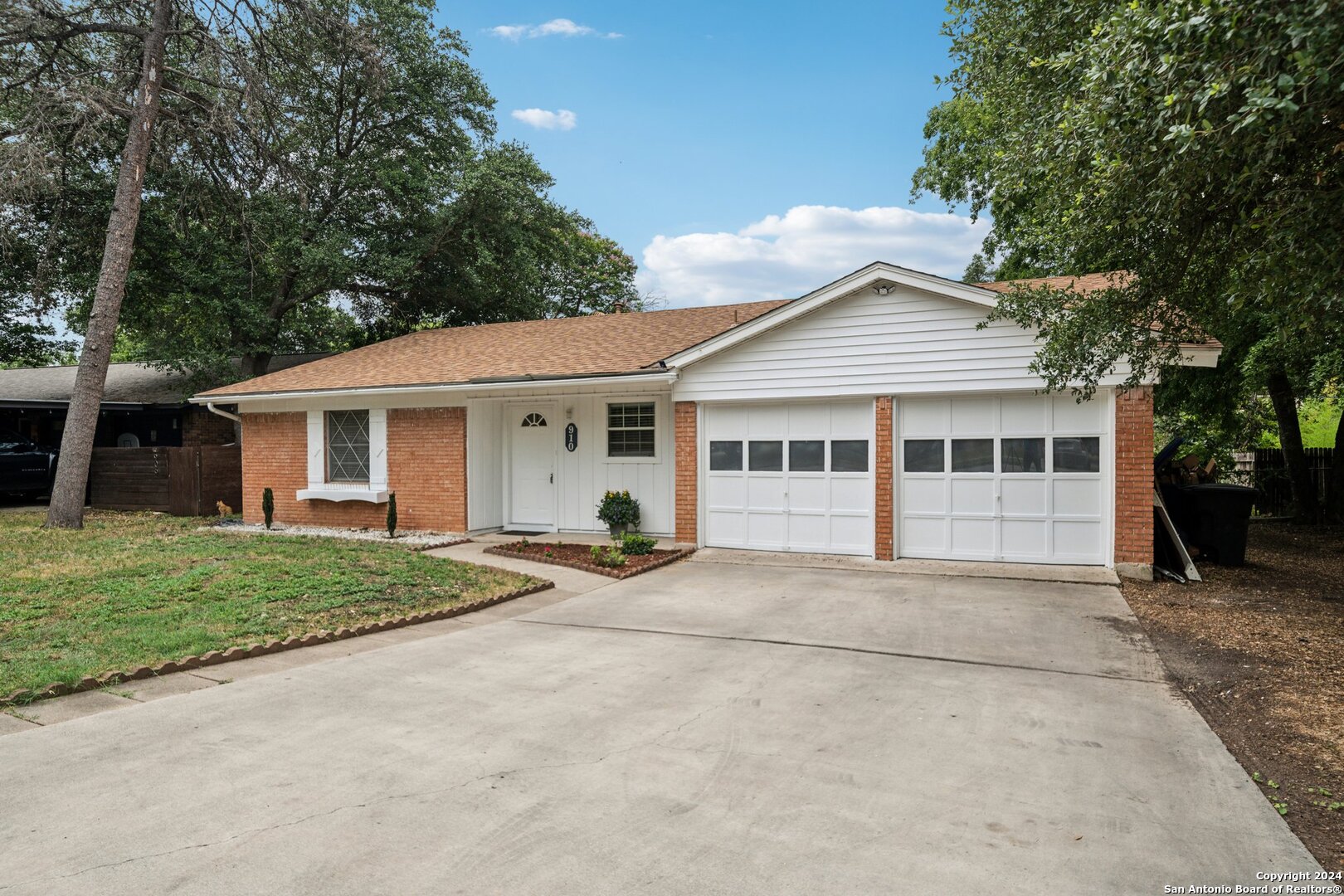 front view of a house and a yard