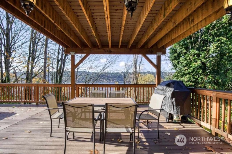 a view of a chairs and table in the patio