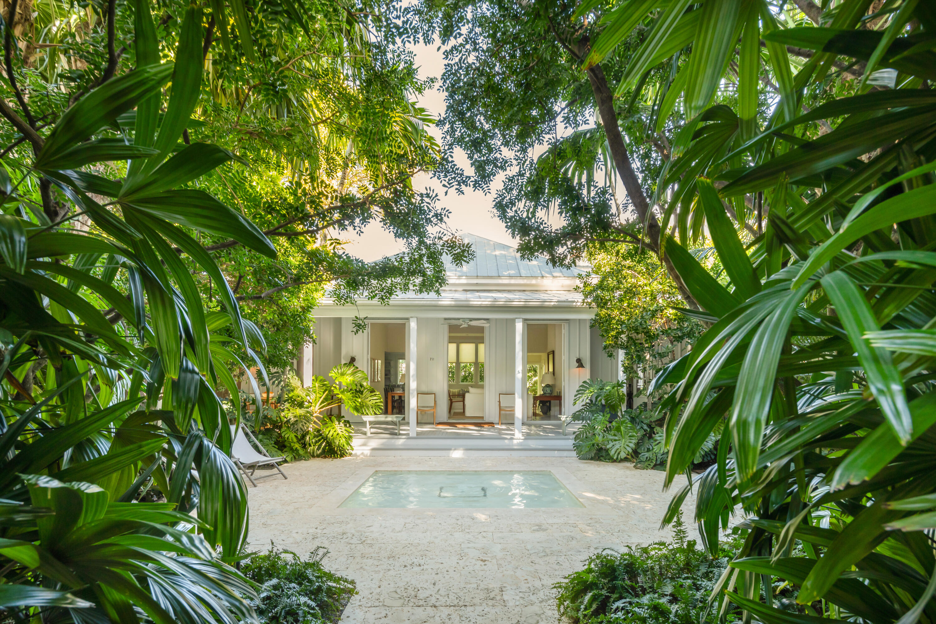 front view of a house with a garden