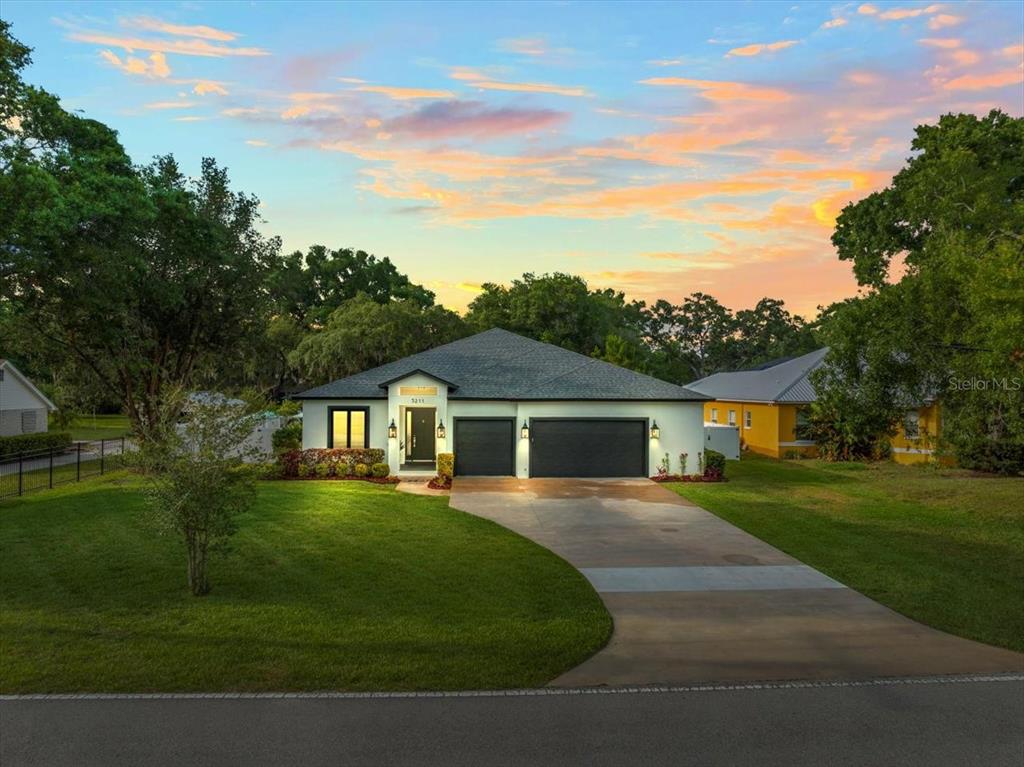 front view of a house with a yard