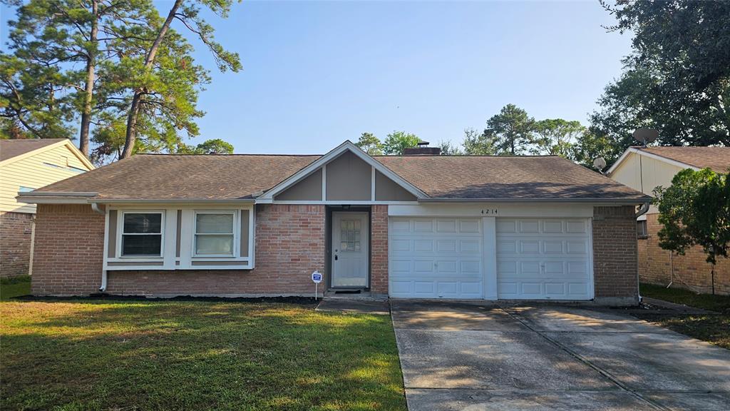 a front view of a house with yard