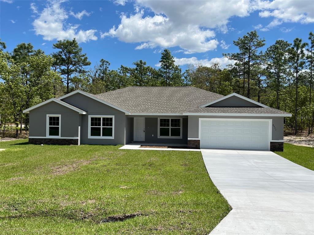 front view of a house with yard