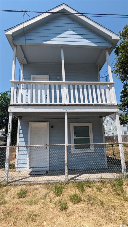 a view of house with porch