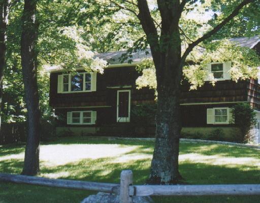 front view of house with a yard