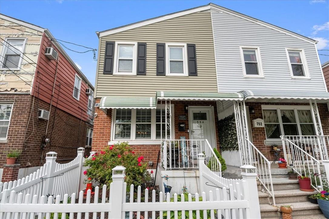 a front view of a house with a porch