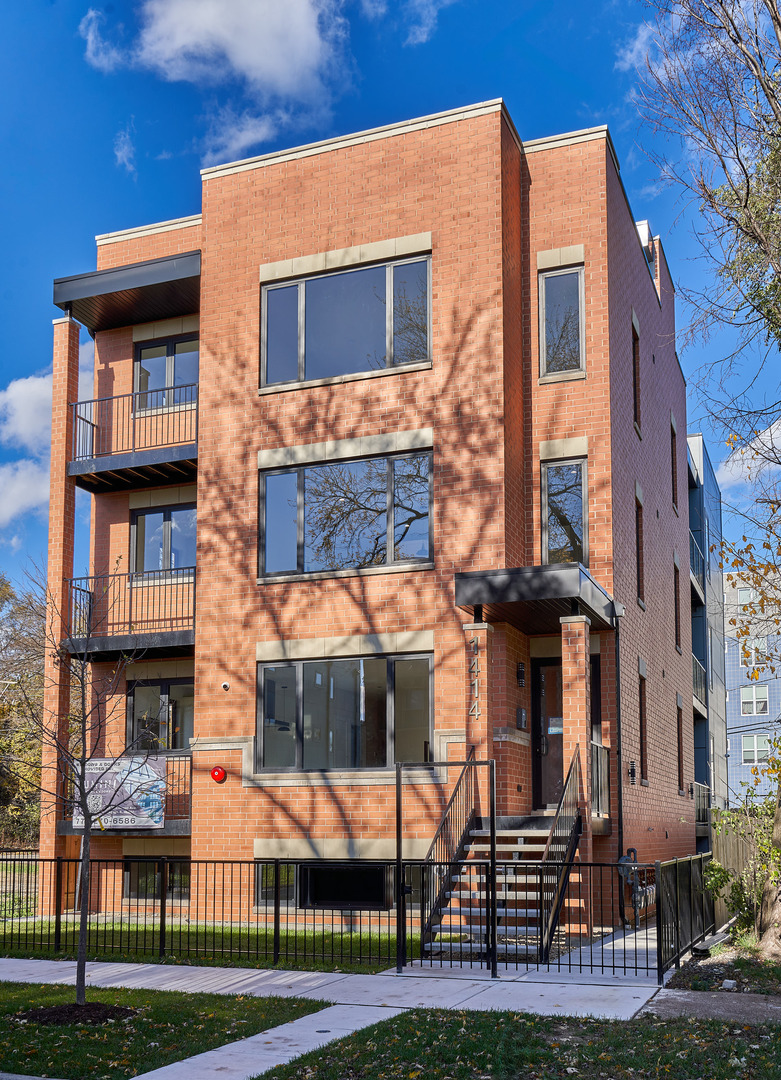 a view of building with brick walls