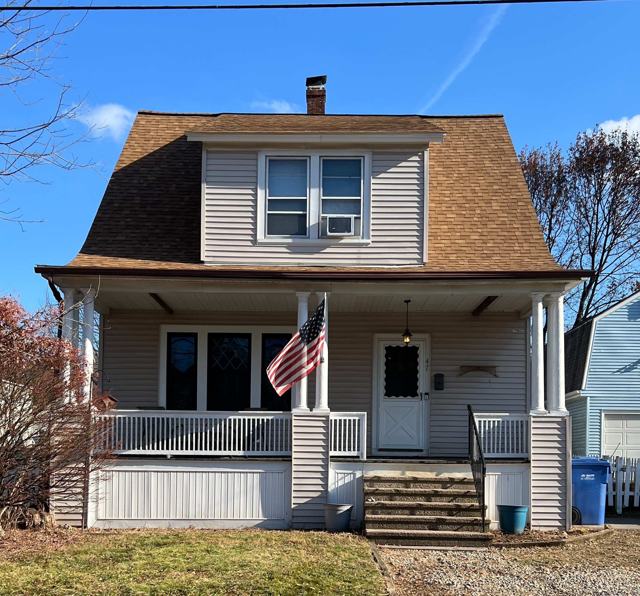 a front view of a house with a garage